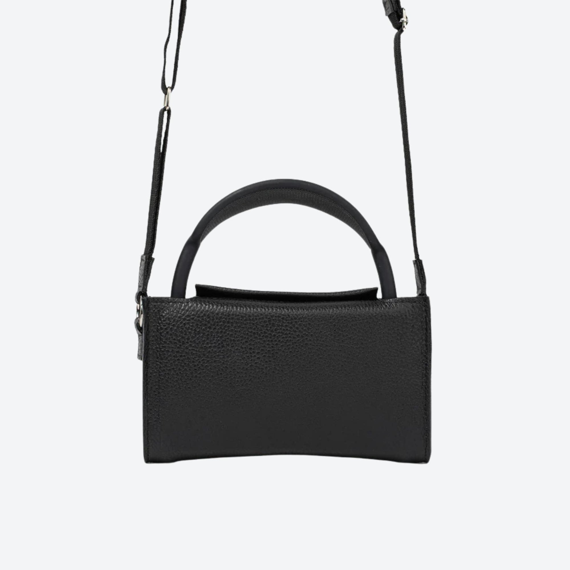Black handbag with a strap on a light gray background