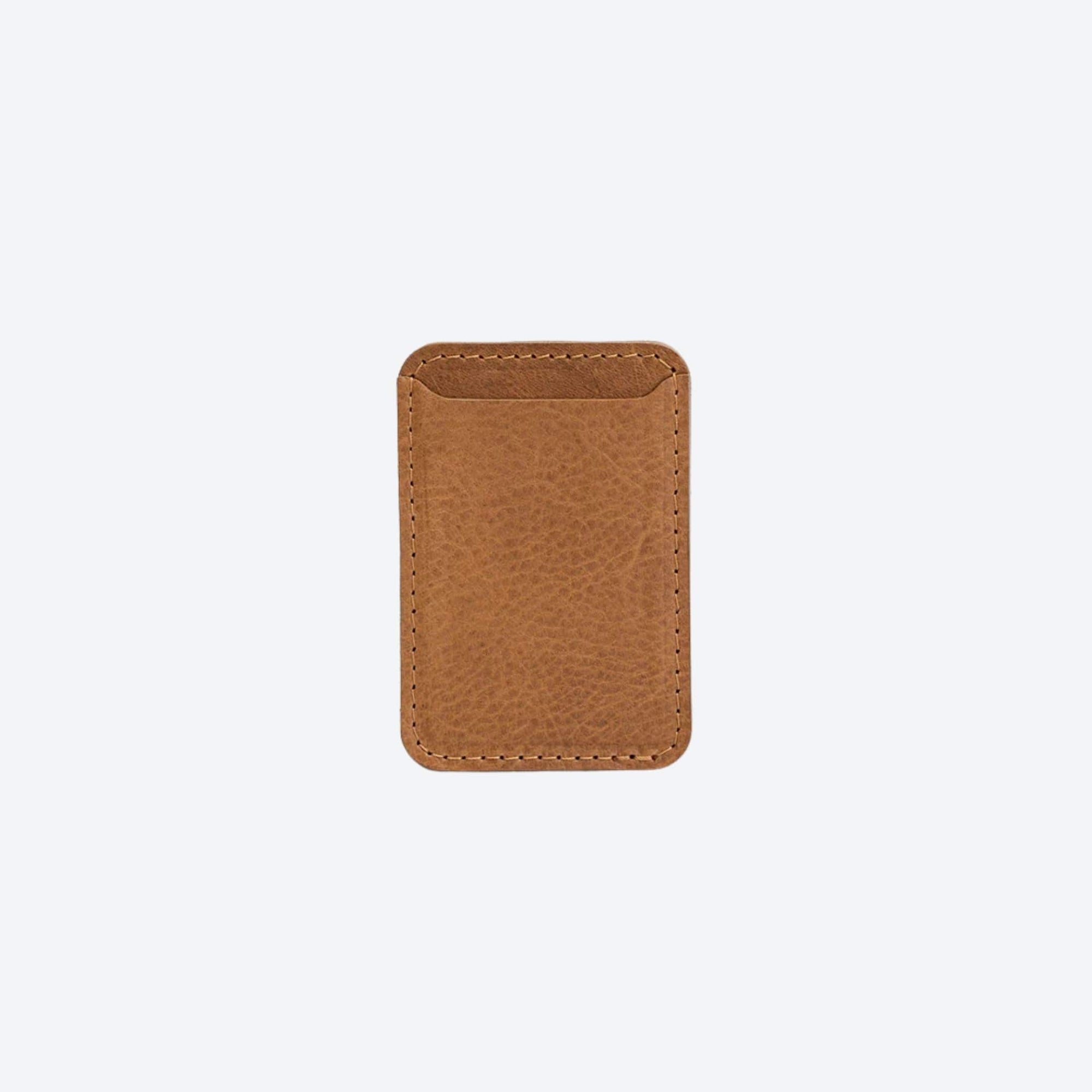 Brown leather cardholder on a white background