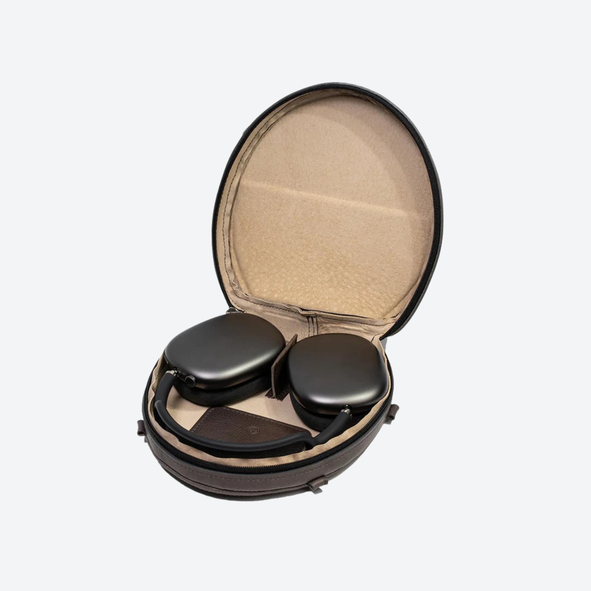 Black headphones in a round brown case on a white background