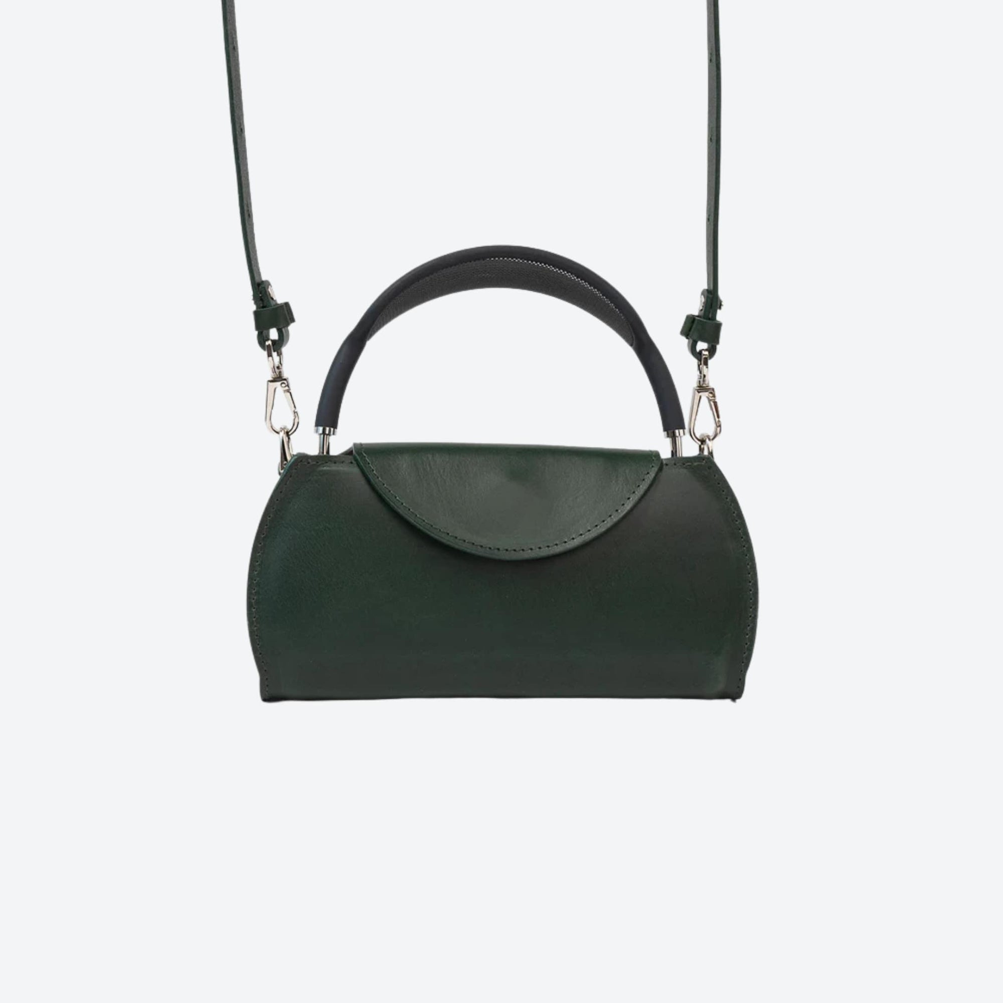 Black handbag with a strap on a white background