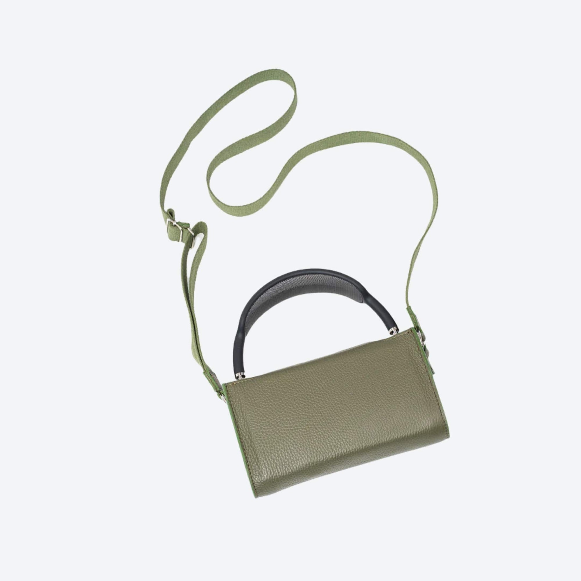 Green handbag with a strap on a light gray background