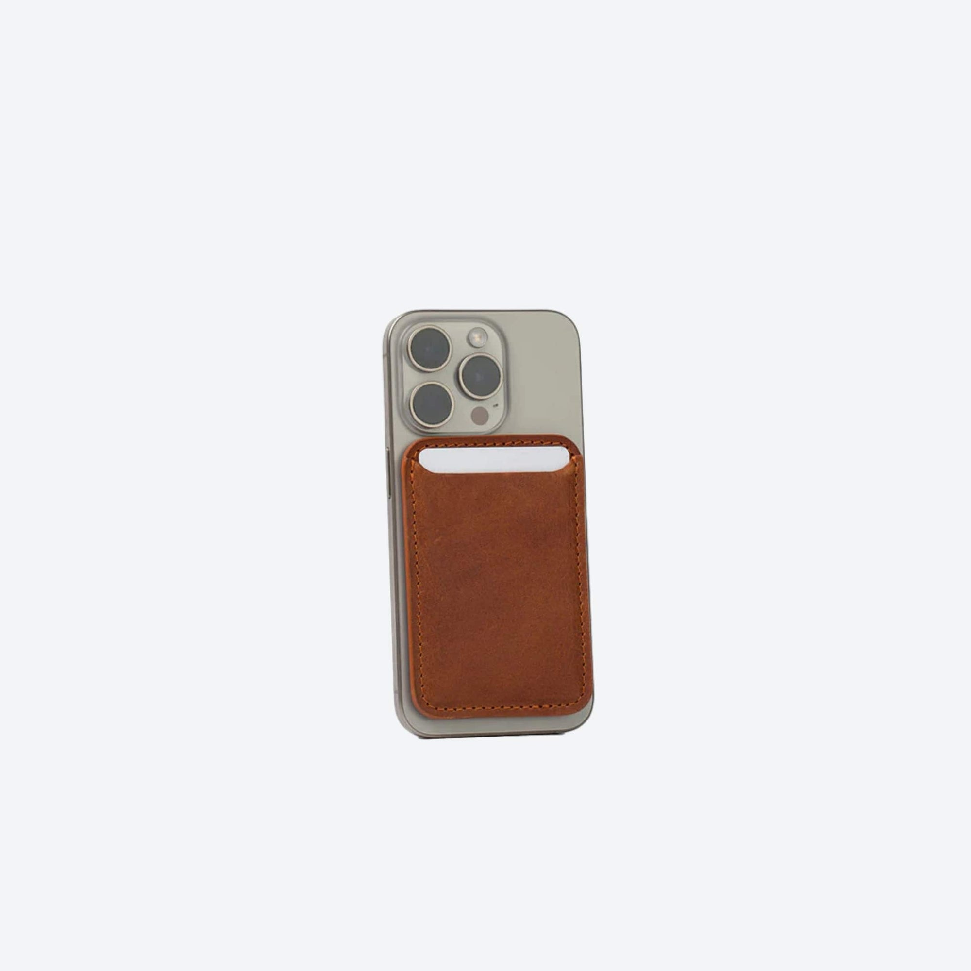 Phone case with a brown cardholder on a white background